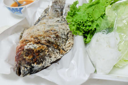 Complementing fish with spicy sauce, Thai style food