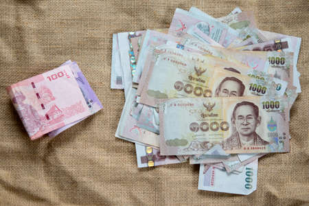 1000 and 100 Thai banknote stack, close up shot.の写真素材