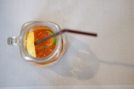 Iced tea with lemon slices, top viewの写真素材