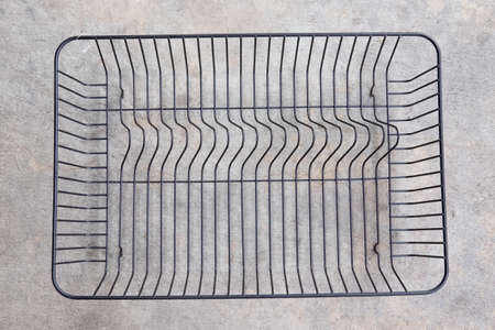 Empty black metal basket, close up basket
