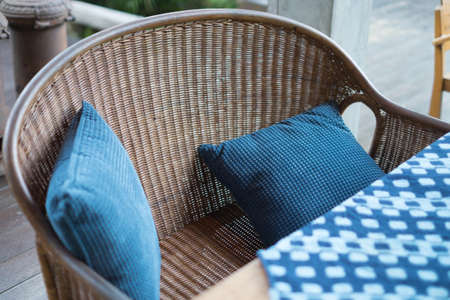 Blue color pillows in chair outdoorの写真素材