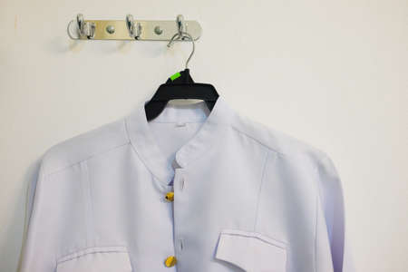 Traditional Thai costume for men on hangerの写真素材