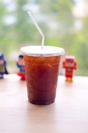 Ice black coffee on the table in the cafe.の写真素材