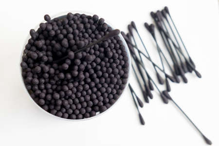 Black cotton cosmetic sticks in box - hygiene itemsの写真素材