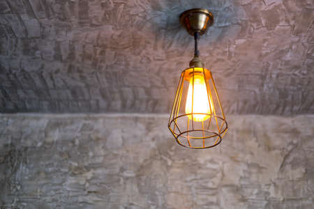 lamp in modern style in grey concrete wall loft style. Select focusの写真素材