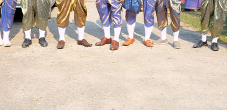 Close up foot Asian man wearing national dress Thailand, Groomsman