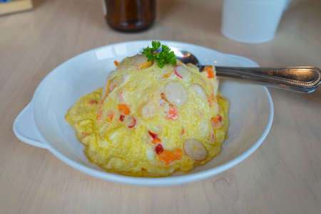 Traditional Thai style Omelet on white dishの写真素材