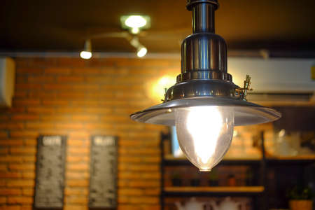 Vintage hanging lamp decoration in coffee shopの写真素材