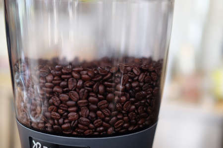 close up boil vapor roasted coffee beans in coffee machine ready for espresso.の写真素材