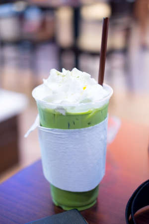 Milk green tea cold ice in takeaway cup