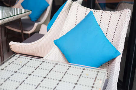 Blue color pillow on armchair white living roomの写真素材