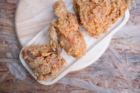 Fried chicken crispy on wood tray, homemade foodの写真素材