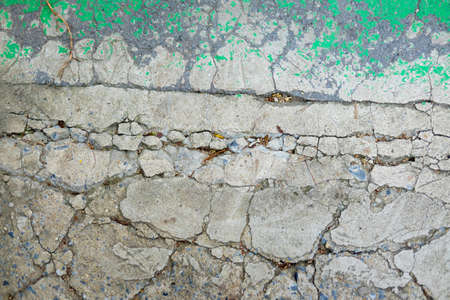 Texture of old plaster damaged brick or concrete wall