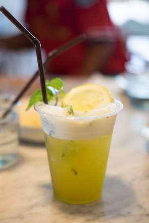 Refreshing drink lemon soda in summer, cold beverage