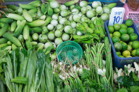 Various fresh vegetables in Thai traditional street market. Healthy food backgroundの写真素材