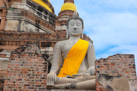 Ancient Buddha statue in Wat Yai Chaimongkol in Ayutthaya, Thailandの写真素材