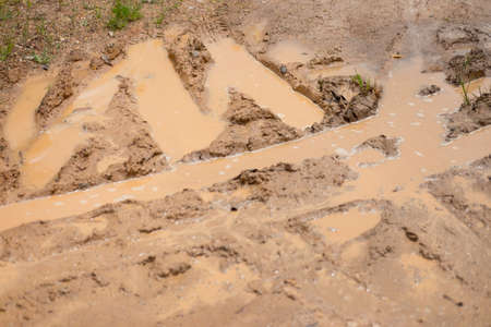 Close up road wet muddy of countrysideの写真素材