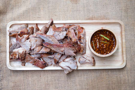 Grilled pork with spicy sauce in Thai style food