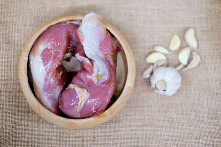 Raw pork with fermented sauce in wooden bowl for grilledの写真素材