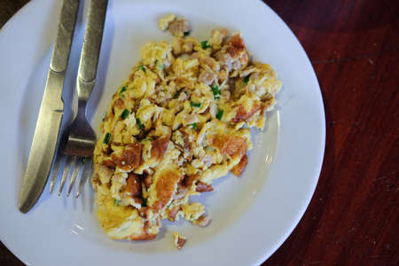 Scrambled egg on white dish,  breakfastの写真素材