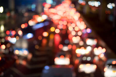 Blurred defocused city lights at night background