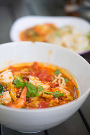 Tom Yum Kung with instant noodle, popular Thai foodの写真素材