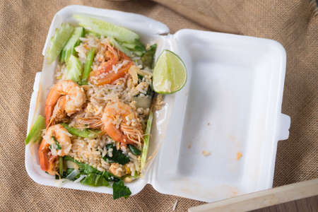 Fried rice with shrimp in box foam, top viewの写真素材