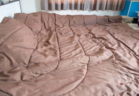 Brown color scheme bedding in homeの写真素材