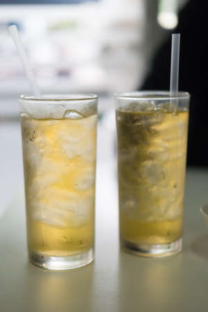 Iced tea on table dinner, two glassの写真素材