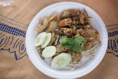 Fried oyster omelet with bean sprouts and shallot call Hoi Tod Khai in Thaiの写真素材