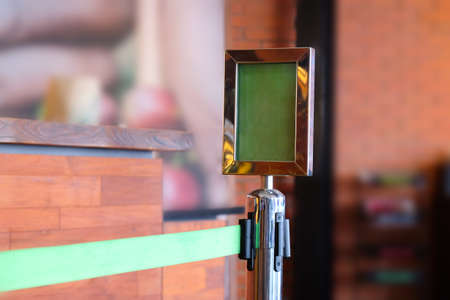 Barricade with green polyester in coffee shopの写真素材
