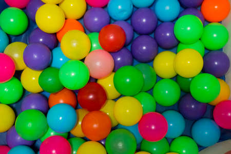 Multi colored plastic balls in at a child's play-park