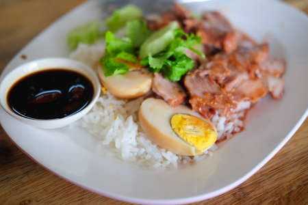 Barbecued red pork in sauce with rice, Thailandの写真素材