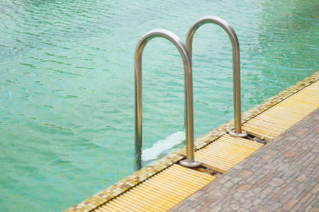 Stairs of the empty swimming poolの写真素材