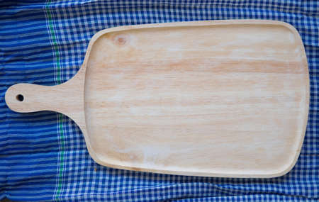 Empty wooden plate for food and vegetable, top viewの写真素材