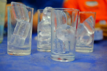 Many of glass with ice cubes, refreshment conceptの写真素材