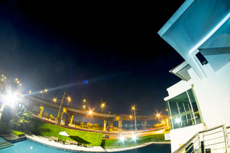 Empty of swimming pool in condominium at night