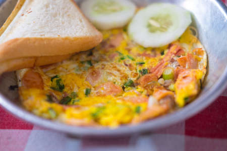 Pan-fried egg with pork and toppings, Breakfast food in Thai styleの写真素材