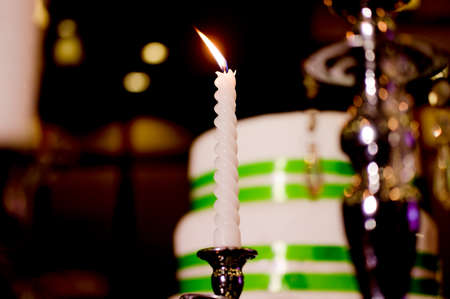 Photo close up one elegant white candlestickの写真素材