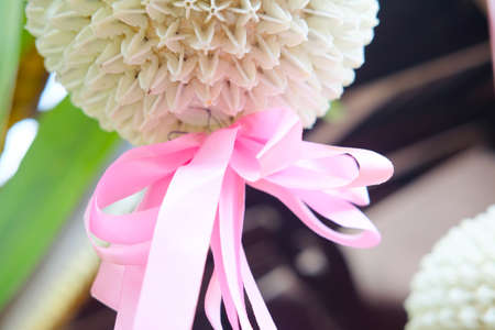 Close up of pink bow decoration in weddingの写真素材
