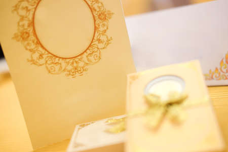 Blank book cover and souvenir on dining table in wedding ceremonyの写真素材