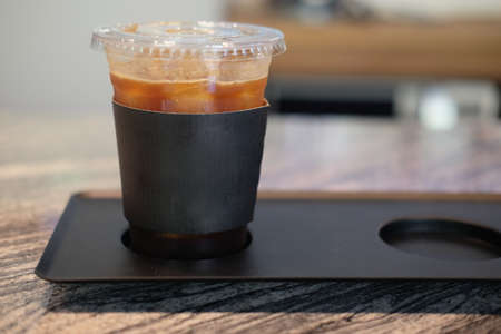 Glass with cold brewed coffee in coffee shopの写真素材