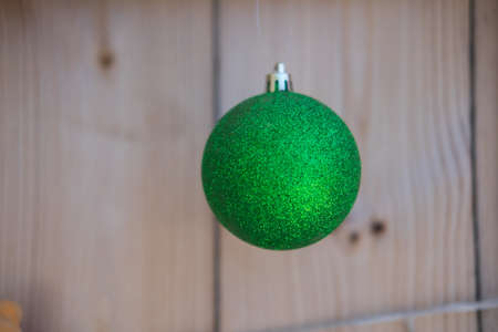 Decoration green ball. Concept of the traditional celebration of New Yearの写真素材