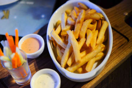 Homemade french fries serve with sour cream or mayonnaise