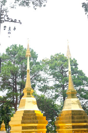 Two golden pagoda or stupa (Wat Phra That Doi Tung) Mae Sai, Chiang Rai, Thailand, They are public domain or treasure of Buddhismの写真素材