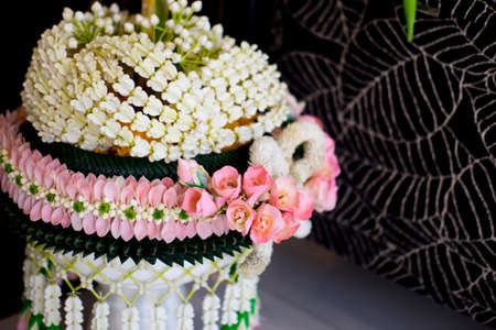 Thai garlands of Thai wedding ceremony put on tray for wedding  (selective focus)の写真素材