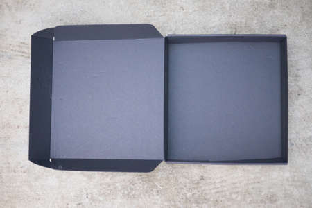 Opened black box with lid, top view