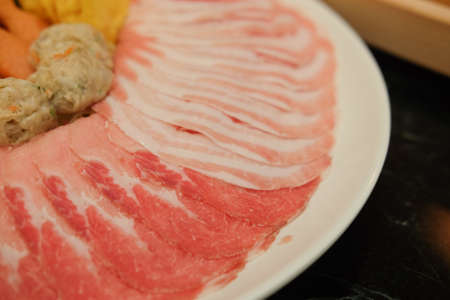 Sliced pork dish for Sukiyaki or chabu chabuの写真素材