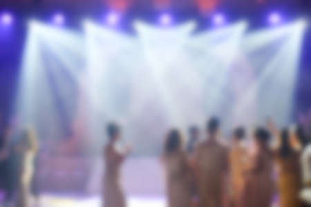 Blur light in club party show and silhouette of audience crowd people enjoying the club partyの写真素材