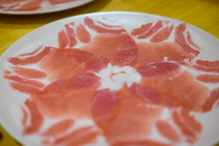 Beef slice ingredient for steamboat or hot pot cooking.の写真素材